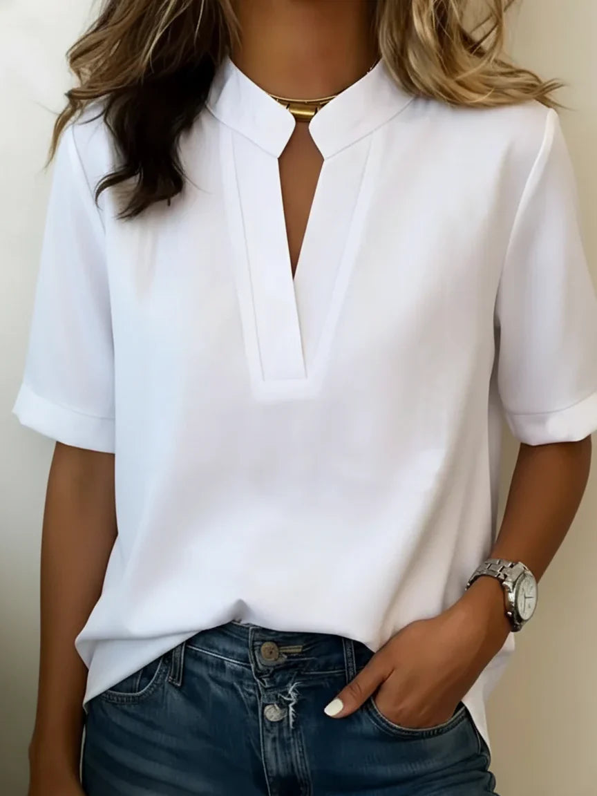 Blusa elegante con cuello refinado |